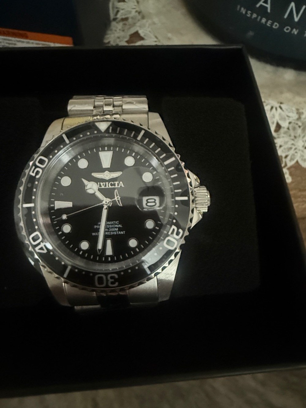 Invicta Silver Stainless Steel Watch with Black Dial and Bezel